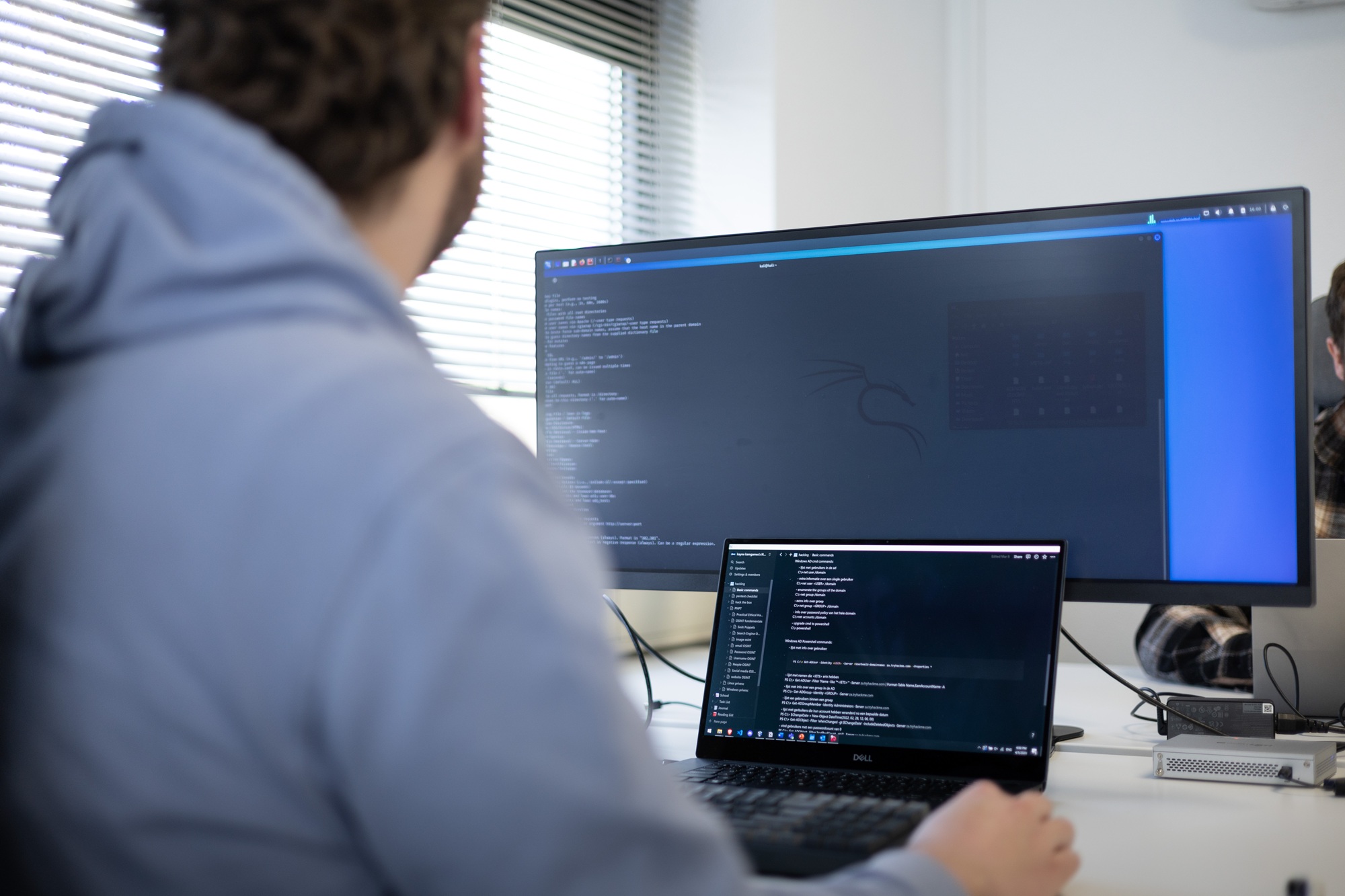 Security specialist running command-line tools on a Kali Linux workstation