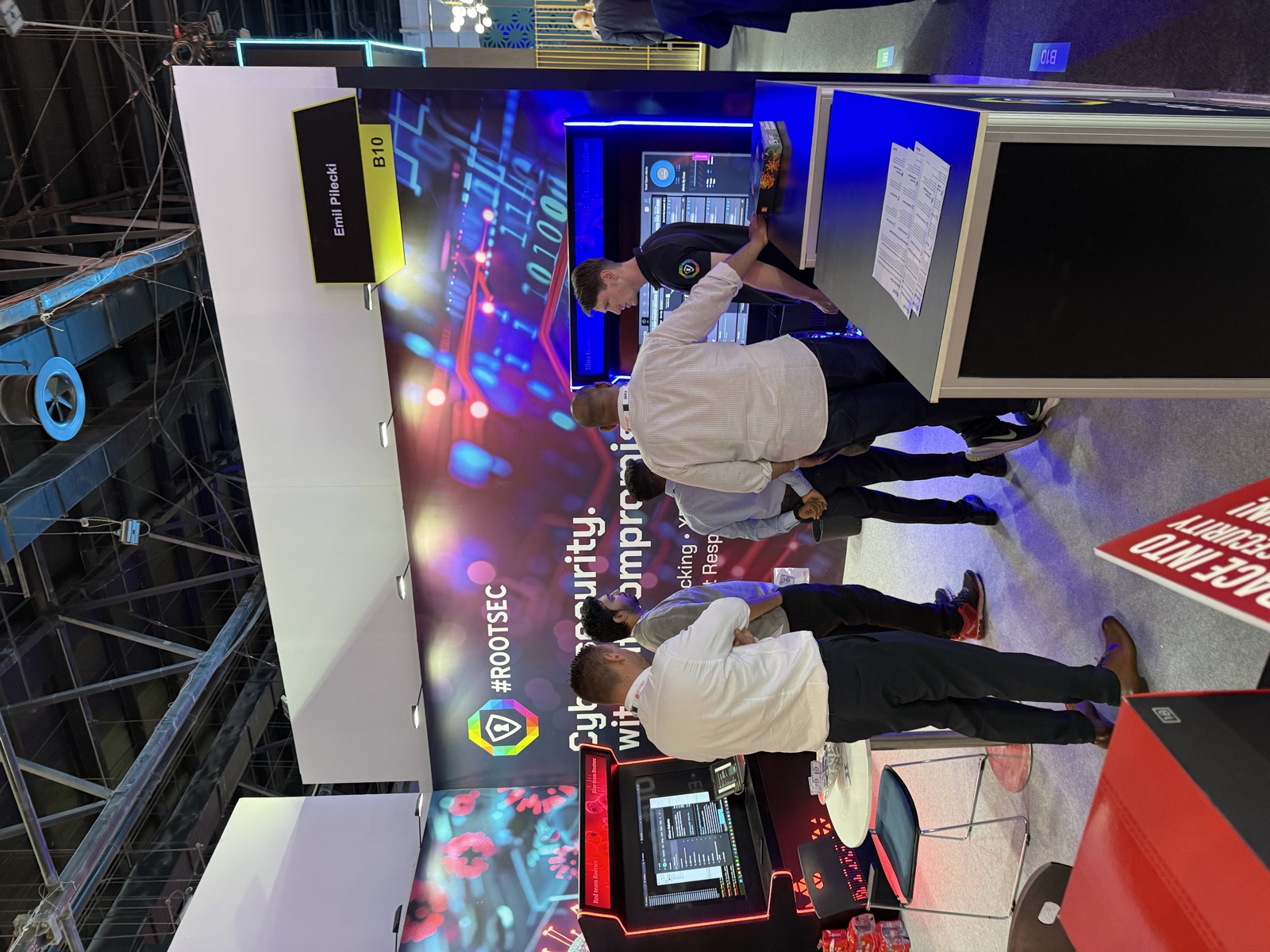 Visitors at the Rootsec stand B10 during GISEC in Dubai